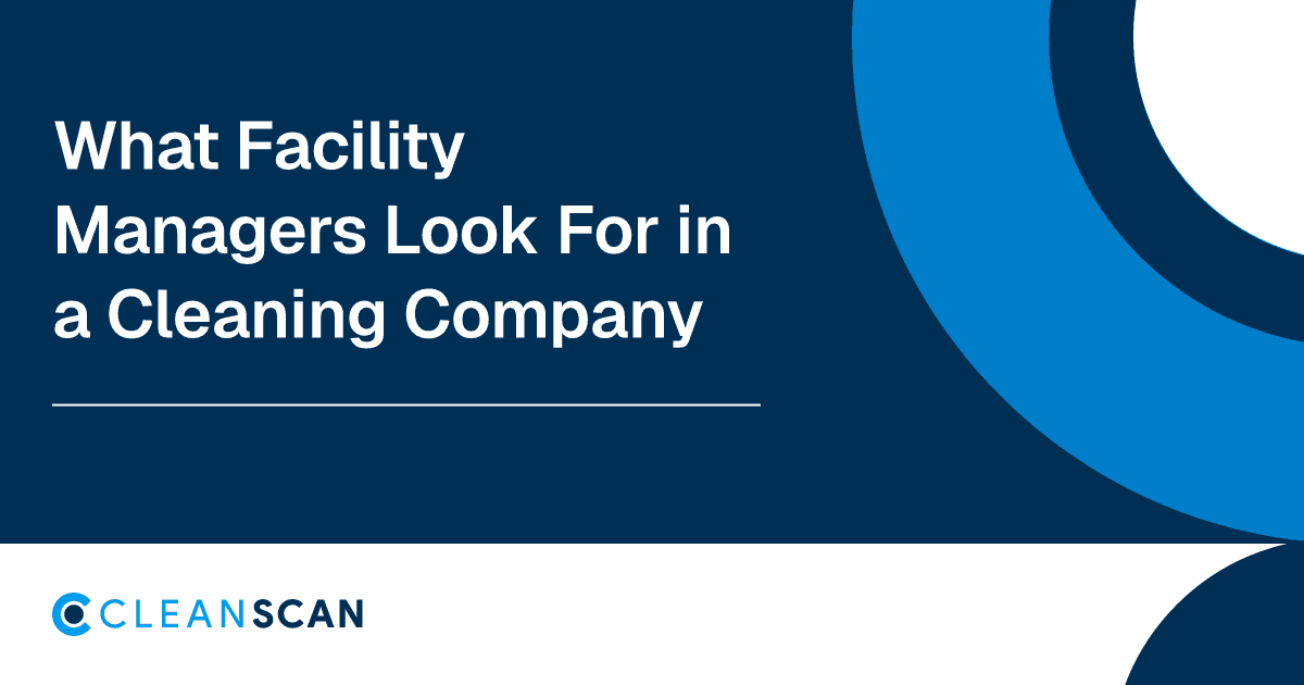 Facility manager reviewing a cleaning service report on a clipboard in a commercial building lobby